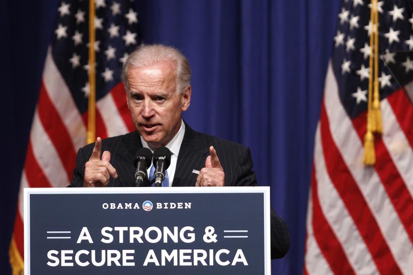 Joe biden on the diaz giving speech Image shows Joe Biden addressing the people. INTERNATIONAL STUDENTS like JOE BIDEN